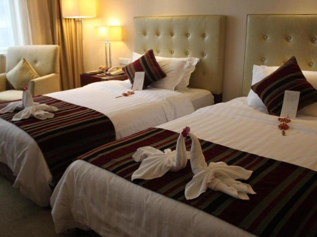Maison New Century Hotel Нінбо Екстер'єр фото