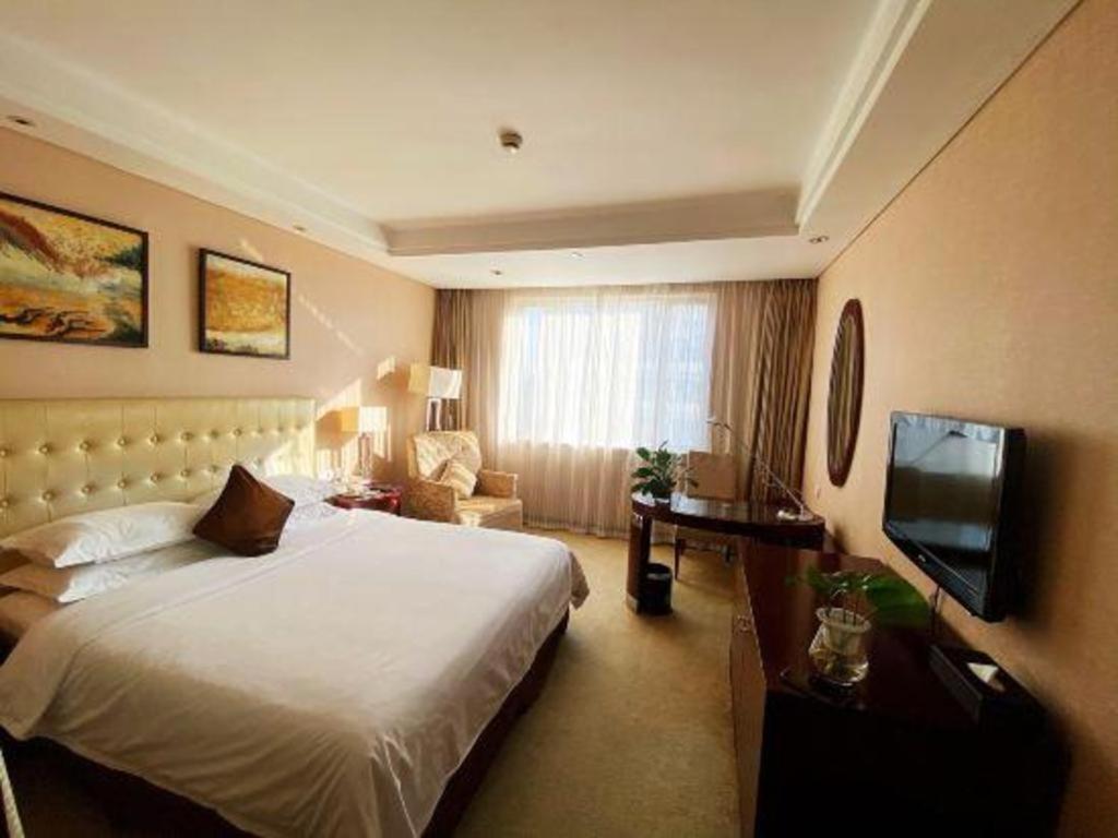 Maison New Century Hotel Нінбо Екстер'єр фото