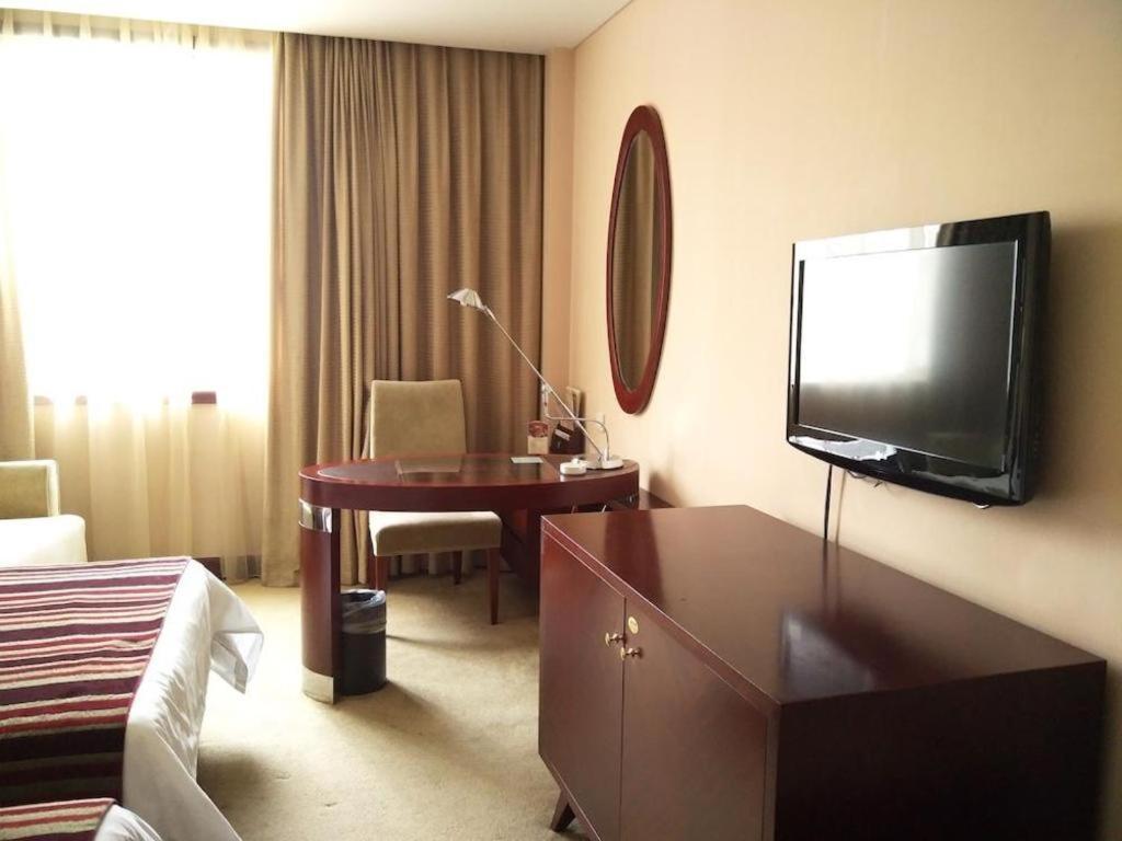 Maison New Century Hotel Нінбо Екстер'єр фото